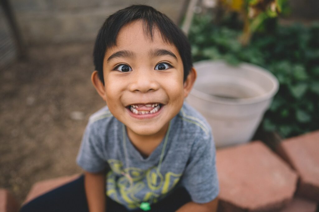 Cute kid smiling missing teeth